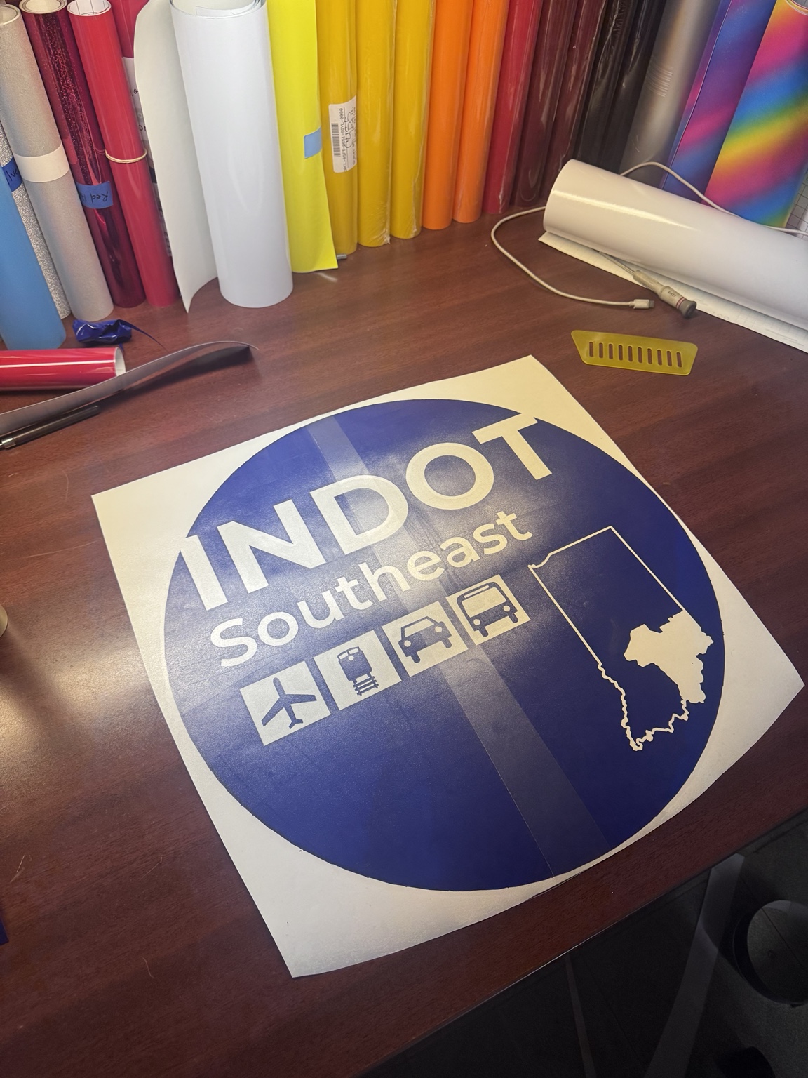 INDOT Southeast logo vinyl graphic on work table